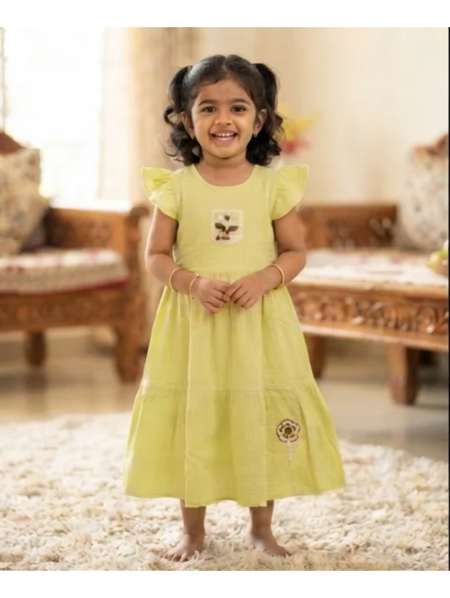Charming Pastel Green Tiered Cotton Dress with Ruffle Sleeves and Floral Applique